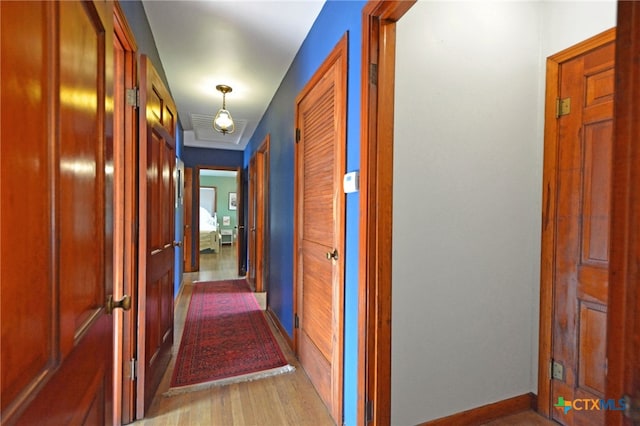 929 E Cedar St, Seguin, TX 78155 - hallway featuring baseboards and light wood finished floors