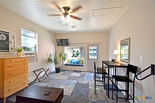 929 E Cedar St, Seguin, TX 78155 - living area with healthy amount of natural light, a ceiling fan, and cooling unit