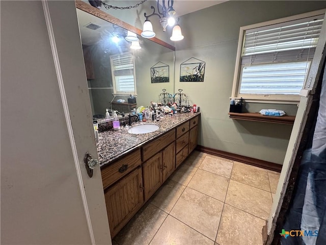 308 Avenue E Ave E, Victoria, TX 77901 - bathroom featuring vanity and tile patterned floors