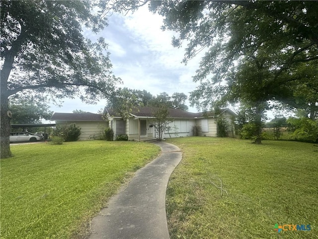308 Avenue E Ave E, Victoria, TX 77901 - view of front facade featuring a front yard