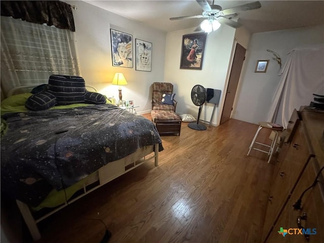 308 Avenue E Ave E, Victoria, TX 77901 - bedroom with wood finished floors and a ceiling fan