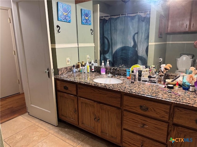 308 Avenue E Ave E, Victoria, TX 77901 - full bathroom with vanity, tile patterned floors, and a shower with curtain