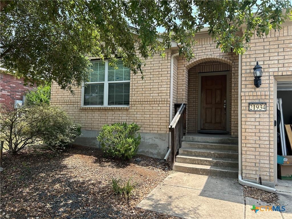 21934 Ruby Run, San Antonio, TX 78259 - entrance to property with brick siding