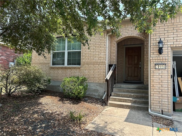 21934 Ruby Run, San Antonio, TX 78259 - entrance to property with brick siding