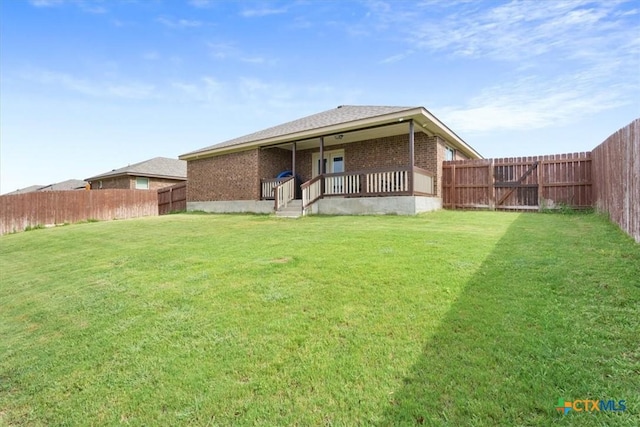 4004 Brookside Dr, Killeen, TX 76542 - back of house featuring brick siding and a fenced backyard