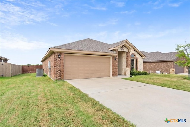 4004 Brookside Dr, Killeen, TX 76542 - single story home with brick siding, driveway, a garage, and a shingled roof