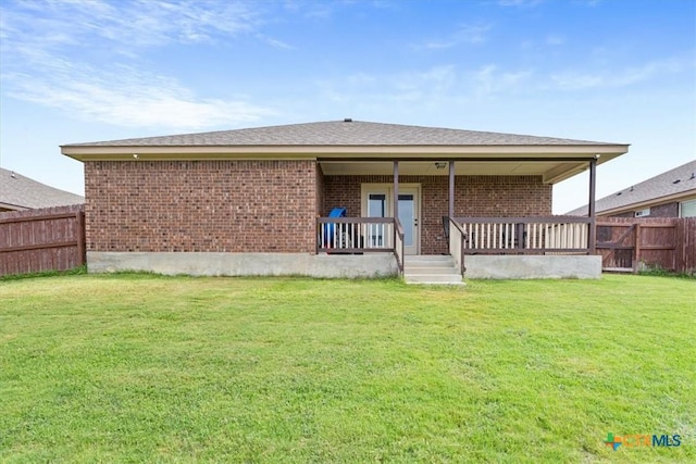 4004 Brookside Dr, Killeen, TX 76542 - rear view of house featuring brick siding and a fenced backyard