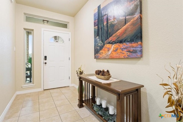 4004 Brookside Dr, Killeen, TX 76542 - foyer entrance with light tile patterned floors and baseboards