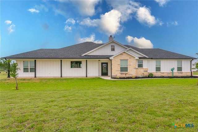 916 Stone Rd, Temple, TX 76501 - ranch-style home with a chimney, a front lawn, and board and batten siding