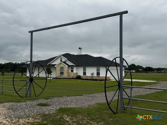 916 Stone Rd, Temple, TX 76501 - single story home featuring a front lawn, driveway, and a chimney