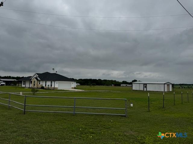 916 Stone Rd, Temple, TX 76501 - surrounding community with a garage and a view of countryside