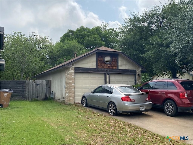1318 Deupree Dr, Austin, TX 78753 - view of property exterior featuring a garage and brick siding