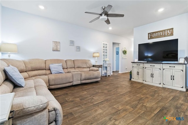 living area with recessed lighting, a ceiling fan, and dark wood-style flooring