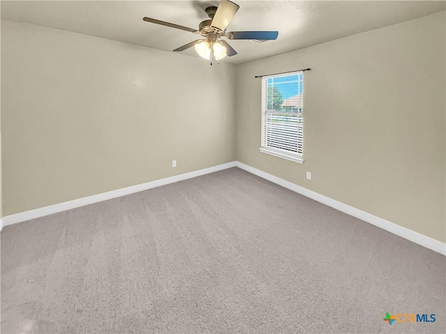 unfurnished room featuring carpet flooring and ceiling fan