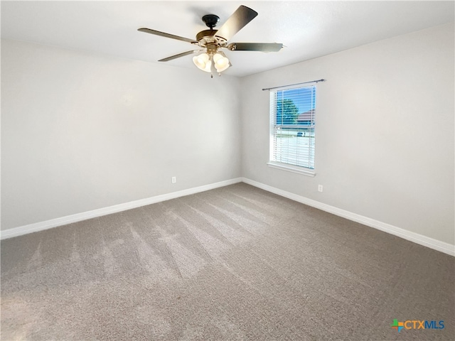 carpeted empty room with ceiling fan