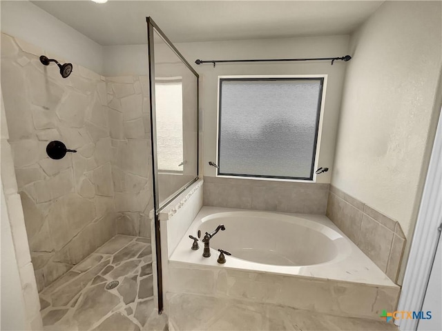 bathroom with plus walk in shower