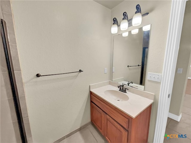 bathroom featuring vanity and tile patterned floors