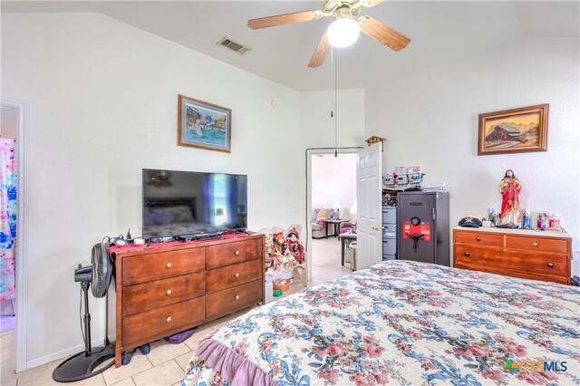 3302 Southhill Dr, Killeen, TX 76549 - bedroom with lofted ceiling, light tile patterned floors, and a ceiling fan
