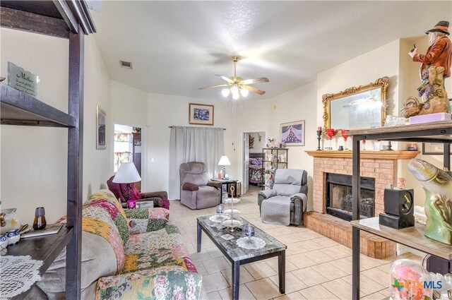 3302 Southhill Dr, Killeen, TX 76549 - living room featuring a brick fireplace, ceiling fan, and tile patterned flooring