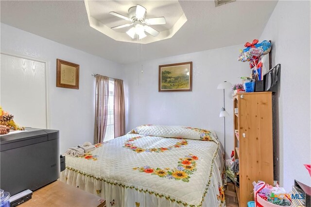 3302 Southhill Dr, Killeen, TX 76549 - bedroom with a tray ceiling and ceiling fan