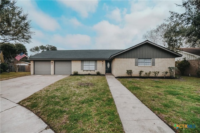 ranch-style house featuring a garage and a front lawn