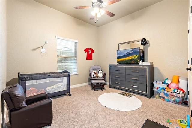 bedroom with ceiling fan and carpet floors