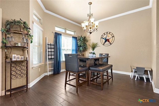 dining room featuring crown molding, dark hardwood / wood-style flooring, and a notable chandelier