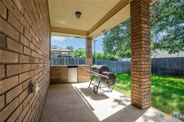 view of patio / terrace featuring a grill