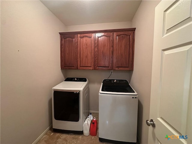 449 Rosehall Ln, Temple, TX 76504 - laundry area with cabinet space and separate washer and dryer