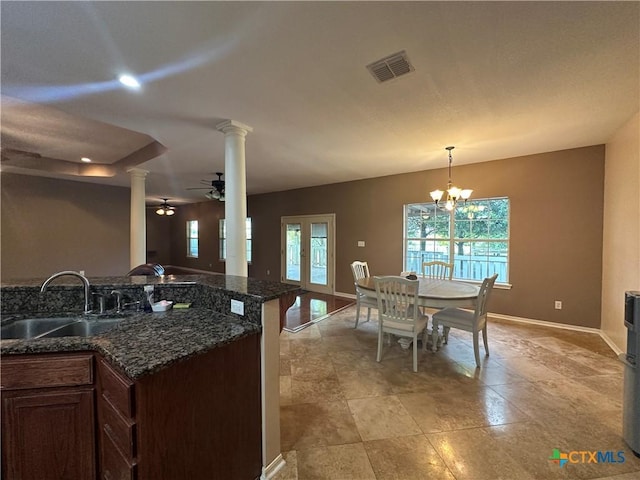 449 Rosehall Ln, Temple, TX 76504 - kitchen with ornate columns, a chandelier, ceiling fan, recessed lighting, and decorative light fixtures
