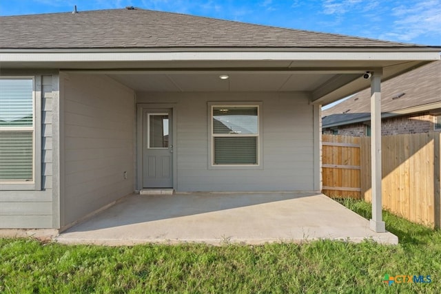 doorway to property with a patio