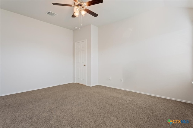 carpeted empty room featuring lofted ceiling and ceiling fan