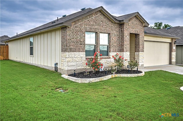 4001 Arafel Ln, Killeen, TX 76542 - single story home with driveway, a front yard, board and batten siding, and a garage