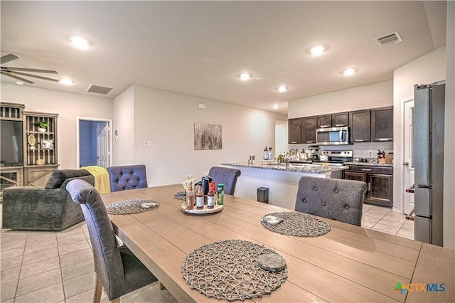 4001 Arafel Ln, Killeen, TX 76542 - dining space featuring ceiling fan, light tile patterned flooring, visible vents, and recessed lighting