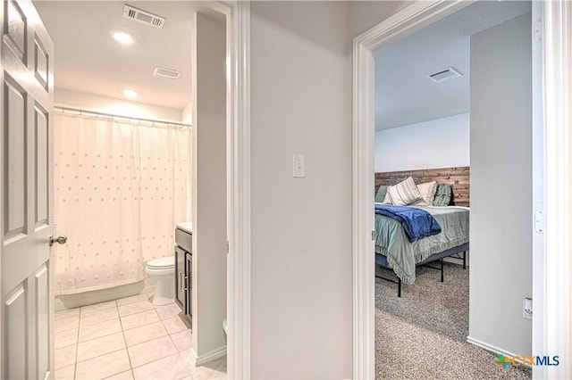 4001 Arafel Ln, Killeen, TX 76542 - bathroom featuring tile patterned flooring, visible vents, toilet, and a shower with shower curtain