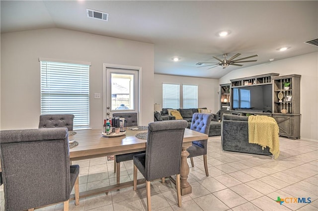 4001 Arafel Ln, Killeen, TX 76542 - dining area featuring light tile patterned flooring, vaulted ceiling, visible vents, and a ceiling fan