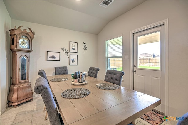 4001 Arafel Ln, Killeen, TX 76542 - dining area with baseboards, vaulted ceiling, visible vents, and light tile patterned floors