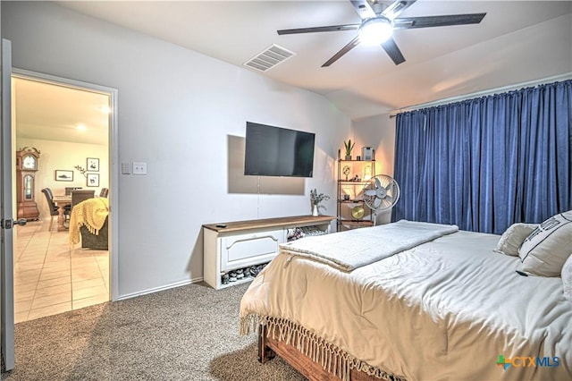 4001 Arafel Ln, Killeen, TX 76542 - carpeted bedroom with ceiling fan, lofted ceiling, tile patterned flooring, and visible vents