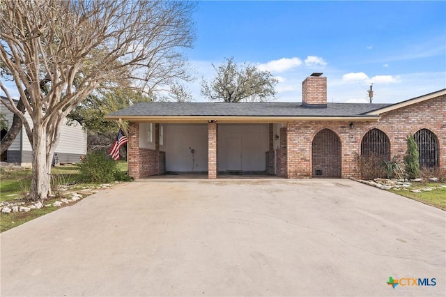 view of front of property with a carport