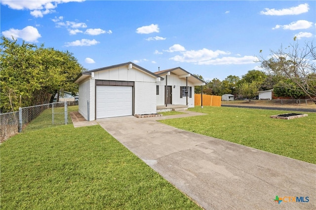 view of front of house with a front lawn and a garage