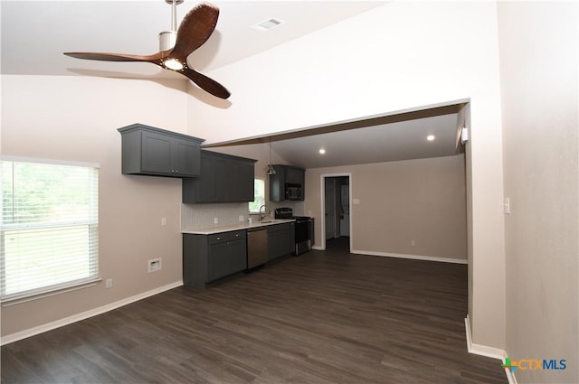 kitchen featuring visible vents, black microwave, stainless steel dishwasher, a sink, and electric stove