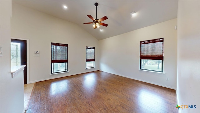 1802 Spring Valley Dr, Dripping Springs, TX 78620 - empty room featuring plenty of natural light, light wood-style flooring, ceiling fan, and high vaulted ceiling