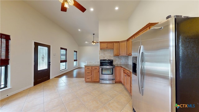 1802 Spring Valley Dr, Dripping Springs, TX 78620 - kitchen featuring appliances with stainless steel finishes, ceiling fan, light tile patterned floors, recessed lighting, and decorative backsplash