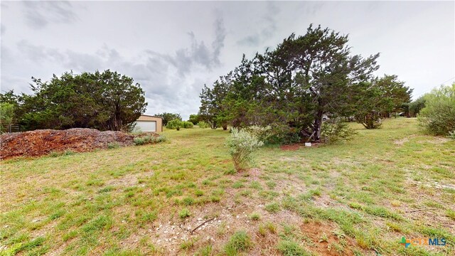 1802 Spring Valley Dr, Dripping Springs, TX 78620 - view of green lawn
