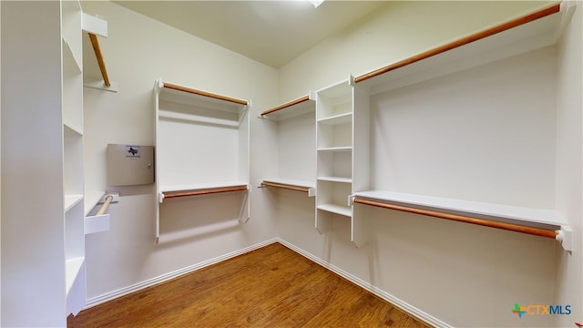 1802 Spring Valley Dr, Dripping Springs, TX 78620 - spacious closet with wood finished floors