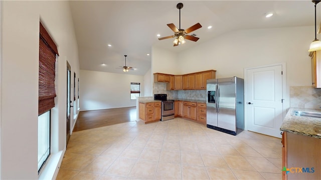1802 Spring Valley Dr, Dripping Springs, TX 78620 - kitchen with stainless steel appliances, a ceiling fan, tasteful backsplash, recessed lighting, and decorative light fixtures