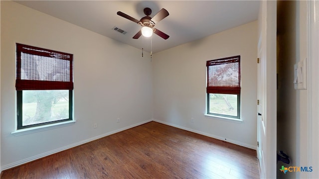1802 Spring Valley Dr, Dripping Springs, TX 78620 - unfurnished room with wood finished floors and a ceiling fan