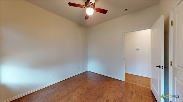1802 Spring Valley Dr, Dripping Springs, TX 78620 - empty room featuring wood finished floors and a ceiling fan