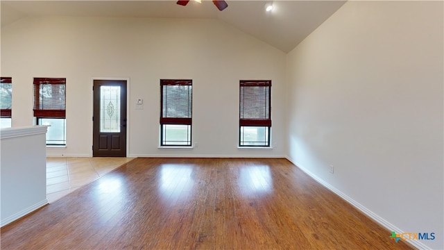 1802 Spring Valley Dr, Dripping Springs, TX 78620 - unfurnished room featuring ceiling fan, light wood finished floors, and high vaulted ceiling