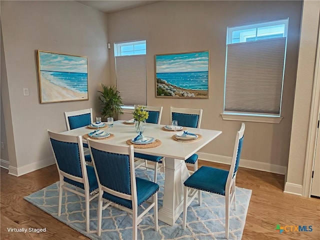 777 N Academy Ave, New Braunfels, TX 78130 - dining room with baseboards and wood finished floors